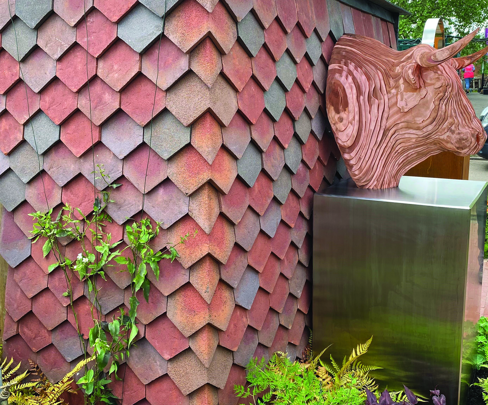 Garden shelter clad in handmade Dreadnought arrowhead tiles provides backdrop for Tom Hiscocks El Toro at RHS Chelsea 2024